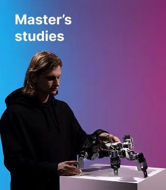 Master's studies at KTU. A young man in a black hoodie working with a quadruped robot placed on a white table, against a vibrant blue and purple gradient background.
